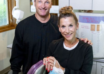 Lisa Brayton and her husband in her dental room